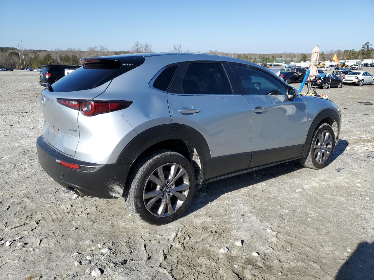 2021 Mazda CX-30 VIN 3MVDMABL5MM237202 Copart auction photo, side / front end damage thumbnail 3