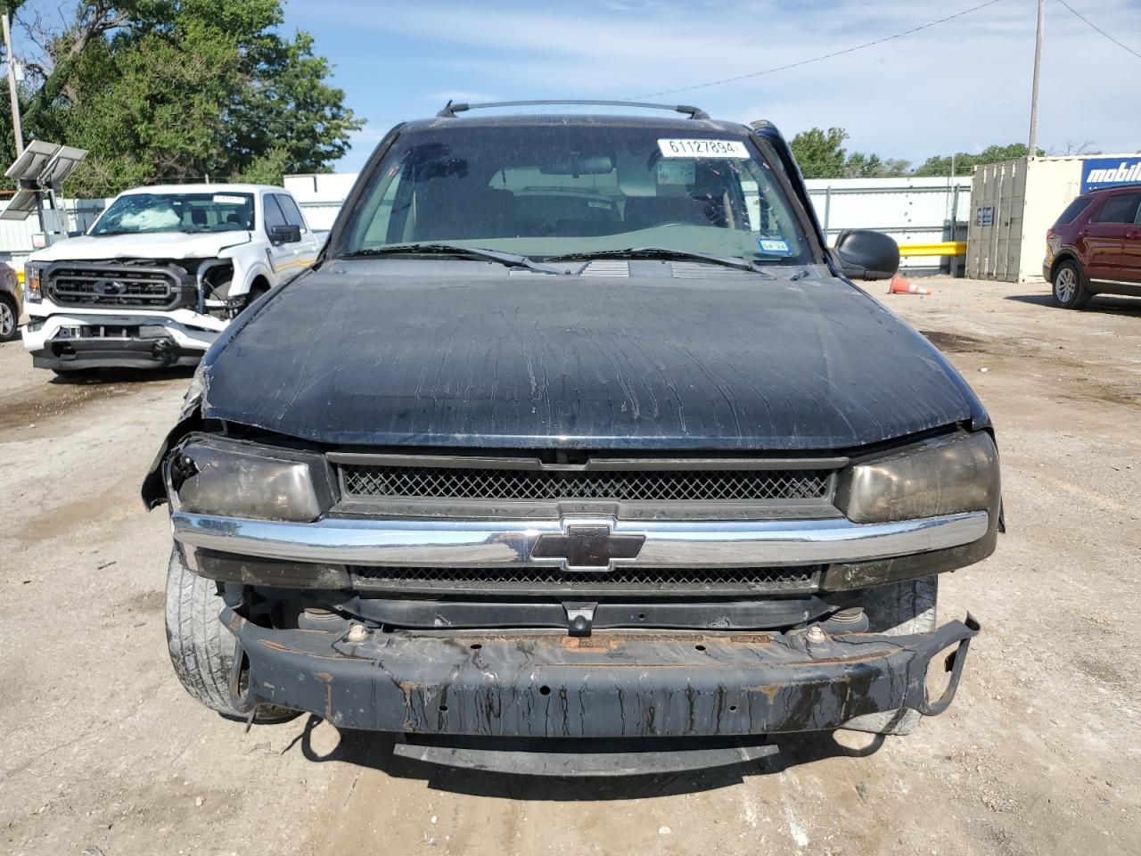 2004 Chevrolet TrailBlazer VIN 1GNDS13S042113771 Copart auction photo, side / front end damage thumbnail 5