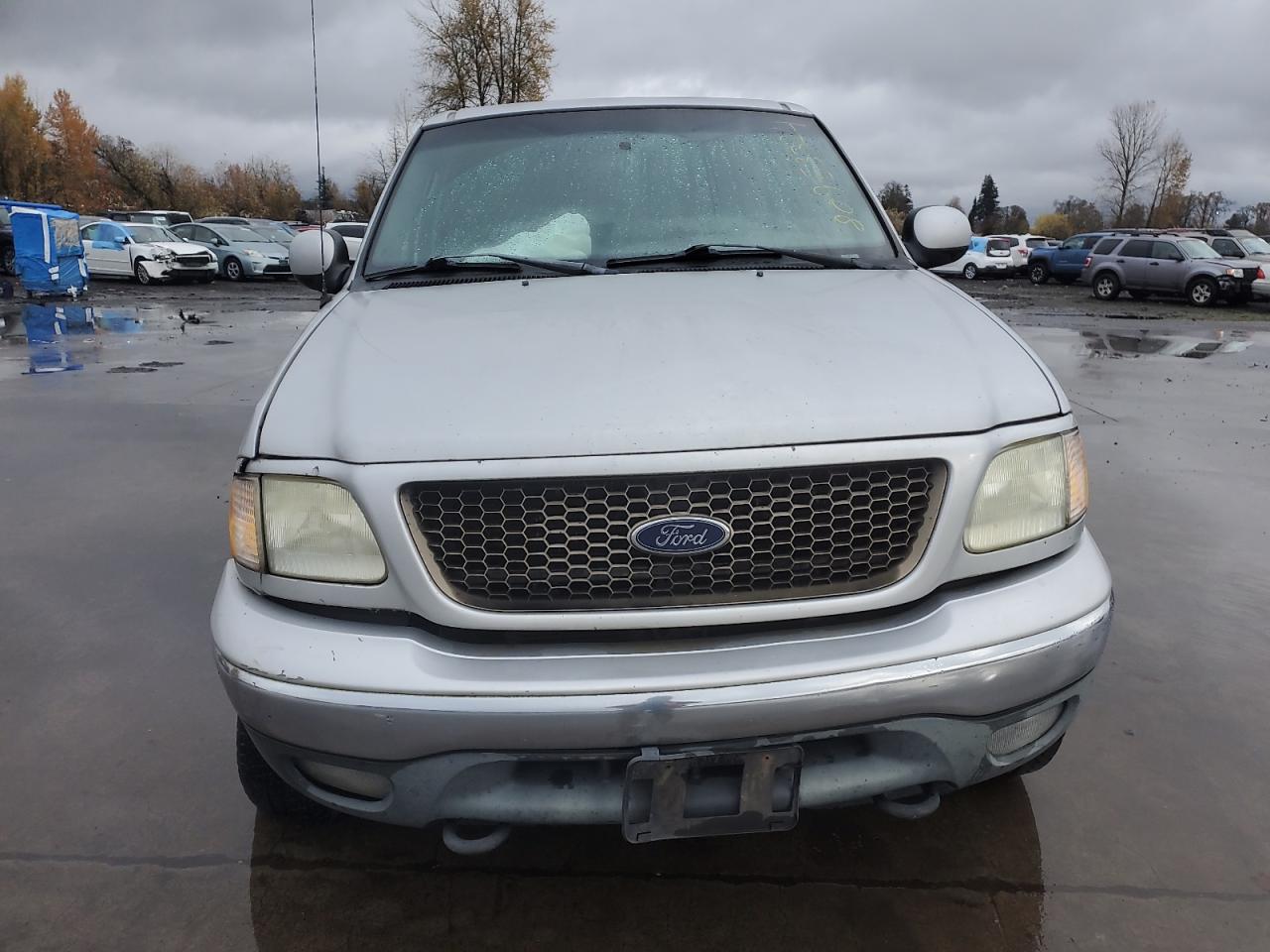 2003 Ford F-150 VIN 1FTRW08L63KB50563 Copart auction photo, side / front end damage thumbnail 5