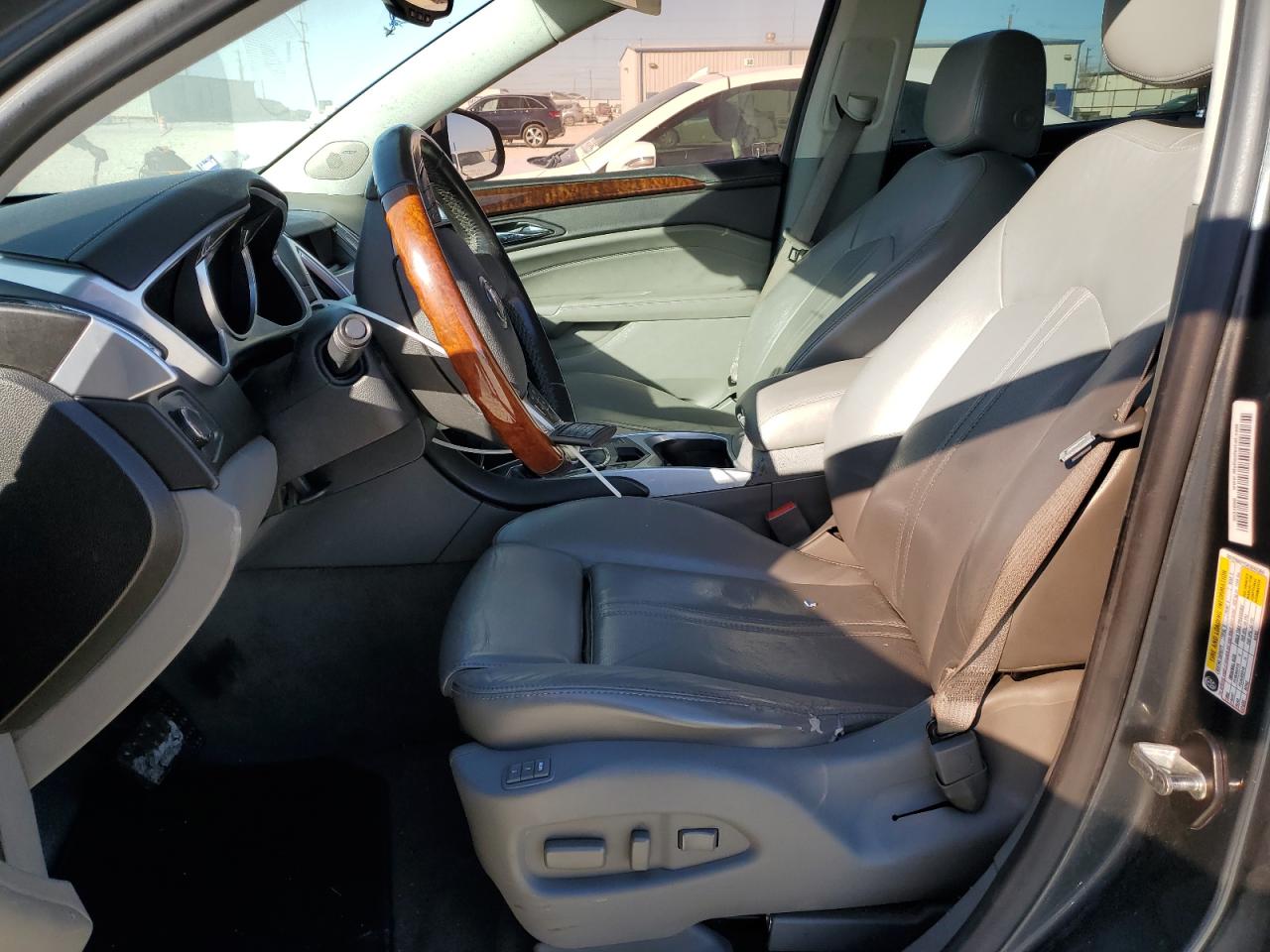 2010 Cadillac SRX VIN 3GYFNAEY5AS643366 Copart auction photo, side / front end damage thumbnail 7