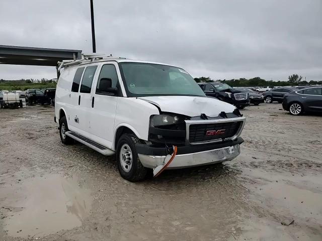 2014 GMC Savana VIN 1GTW7FCA9E1908459 Copart auction photo, front end / minor dent/scratches damage thumbnail 14
