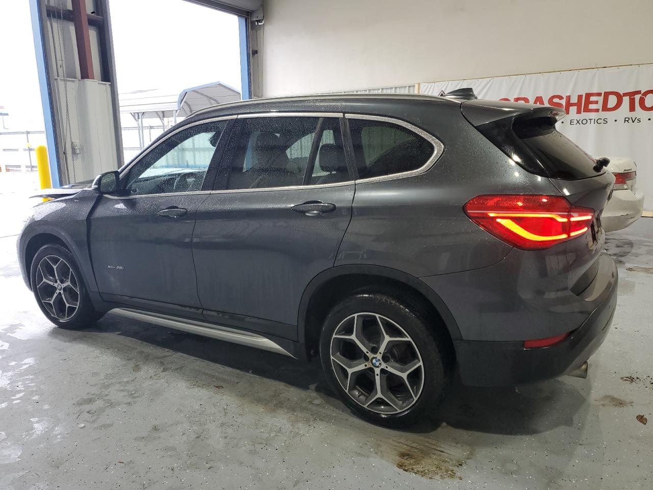 2017 BMW X1 VIN WBXHT3C38H5F73265 Copart auction photo, front end / undercarriage damage thumbnail 2