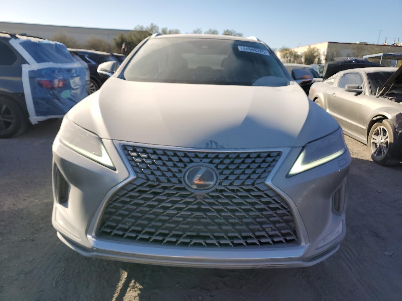 2020 Lexus RX VIN 2T2JZMDA1LC246310 Copart auction photo, side damage thumbnail 5