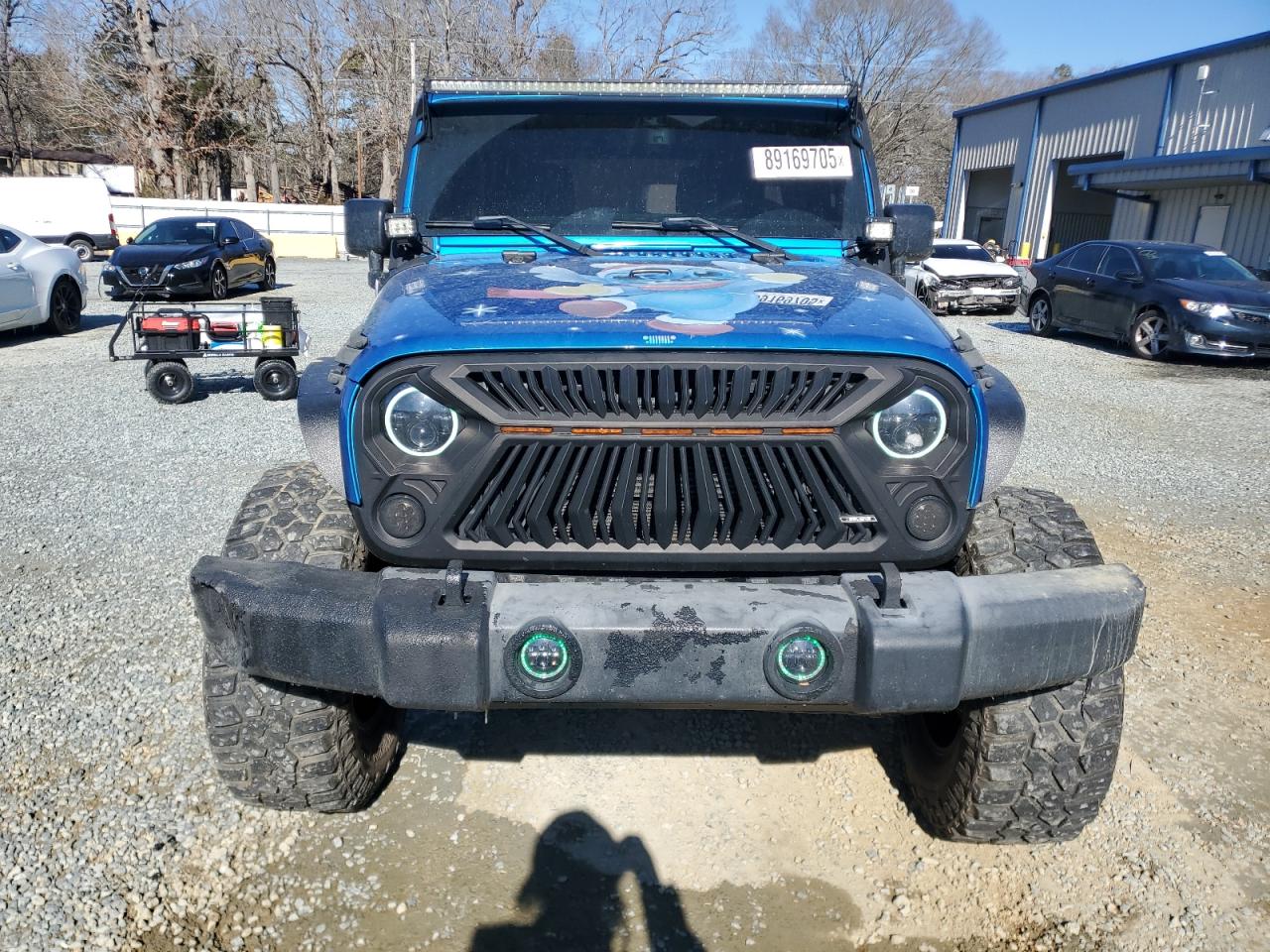 2015 Jeep Wrangler VIN 1C4BJWDG2FL504122 Copart auction photo, front end damage thumbnail 5