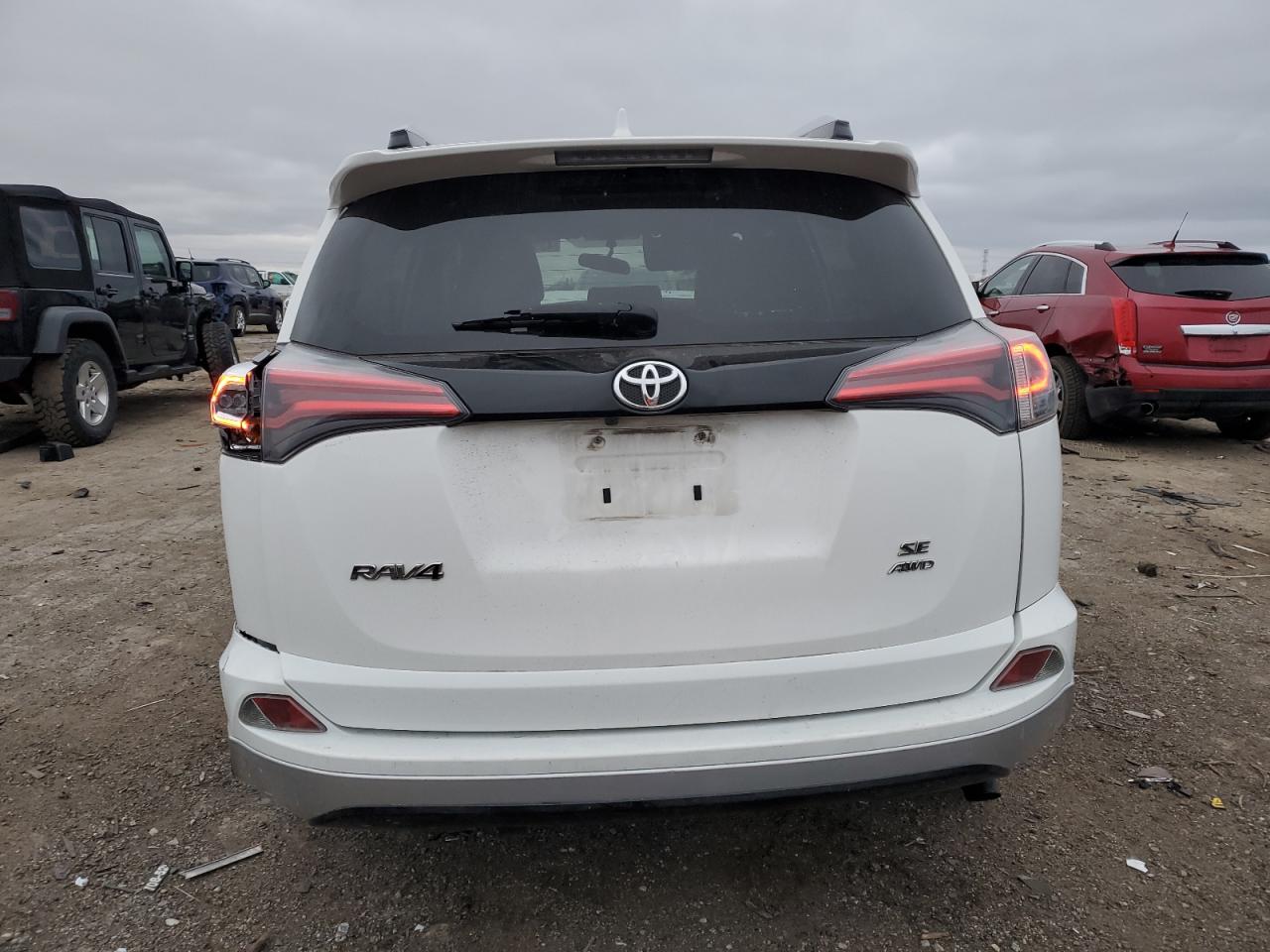 2016 Toyota RAV 4 VIN JTMJFREVXGD185107 Copart auction photo, all over damage thumbnail 6