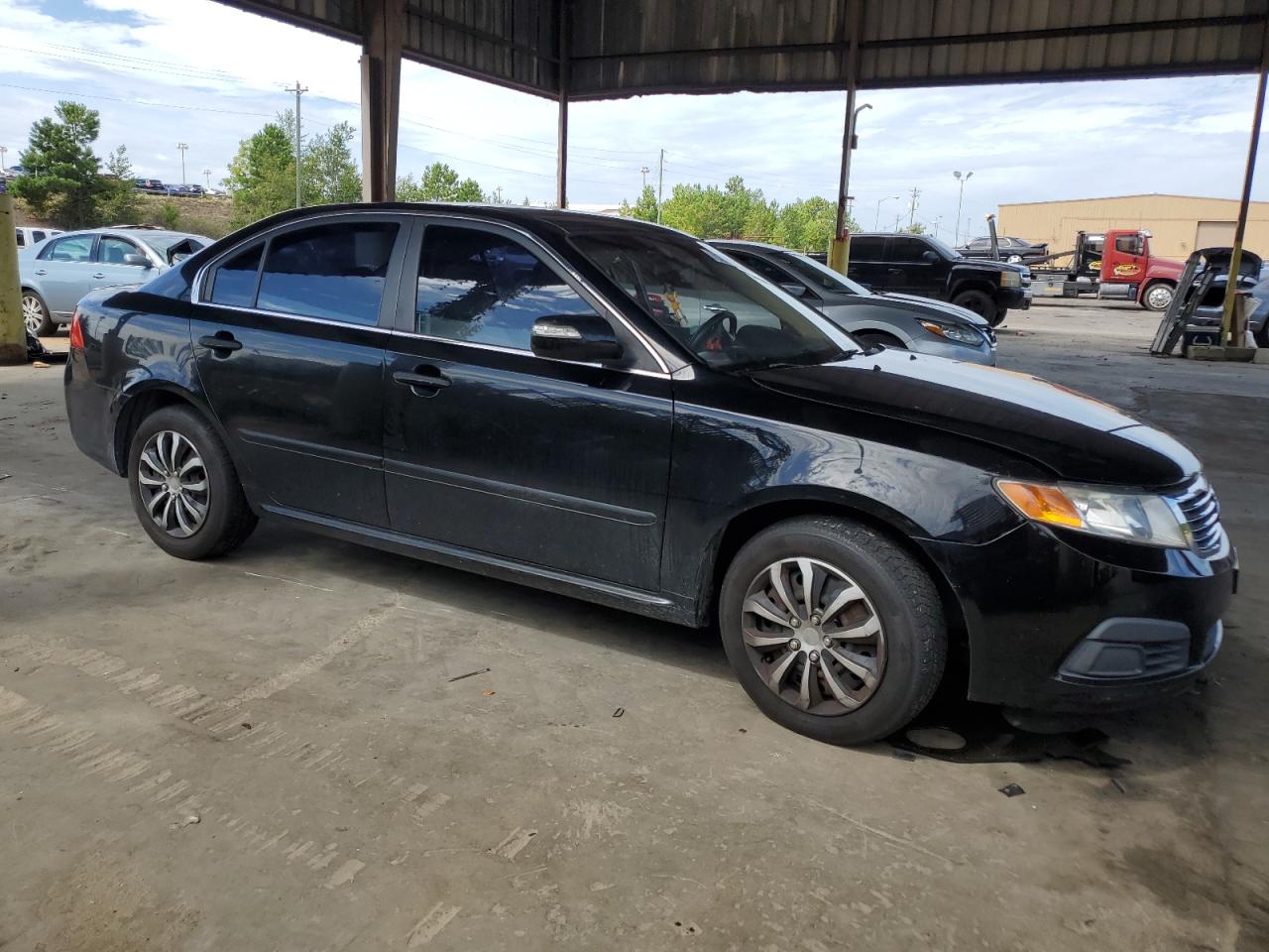 2009 KIA Optima VIN KNAGE228595315713 Copart auction photo, side / front end damage thumbnail 4