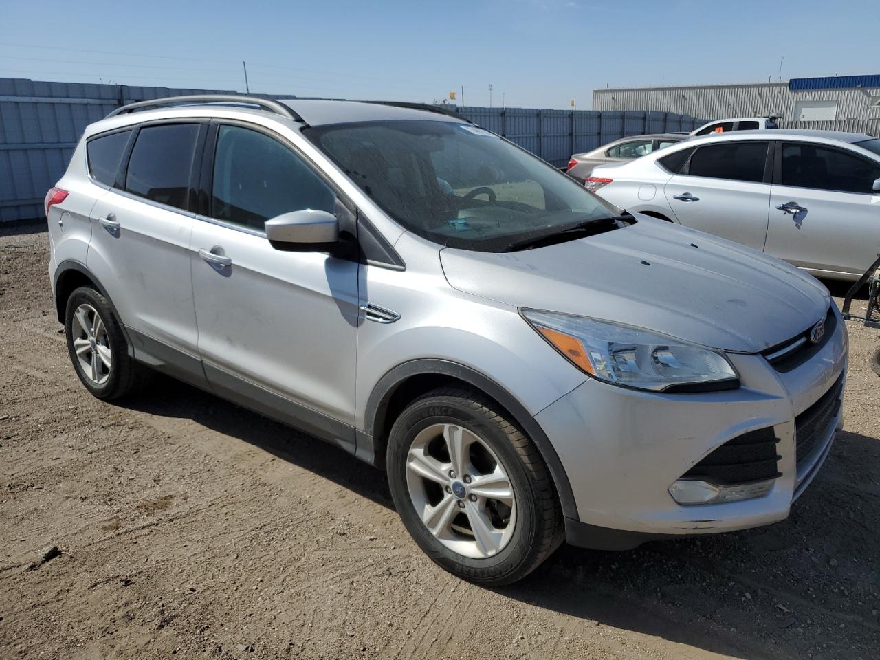 2015 Ford Escape VIN 1FMCU9GXXFUB06736 Copart auction photo, rear end damage thumbnail 4