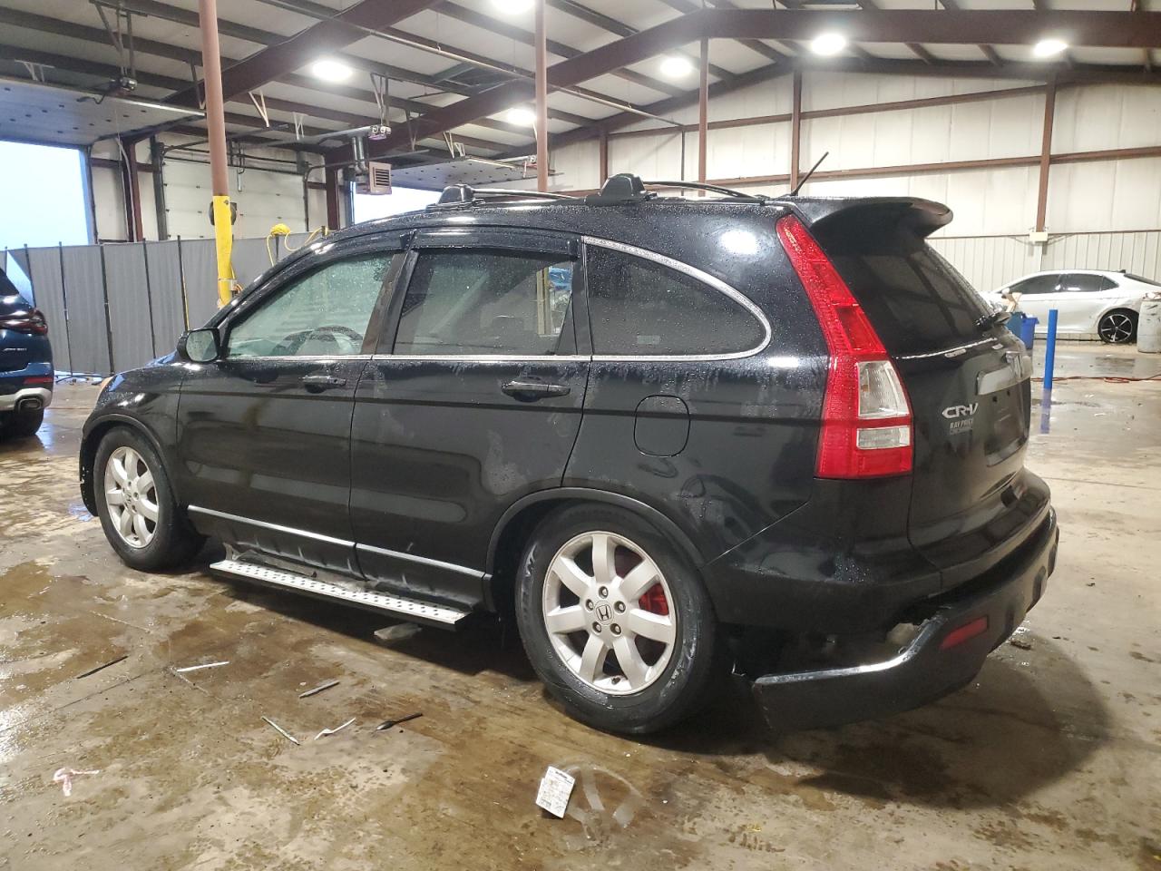2009 Honda CR-V VIN 3CZRE48509G705741 Copart auction photo, side / front end damage thumbnail 2