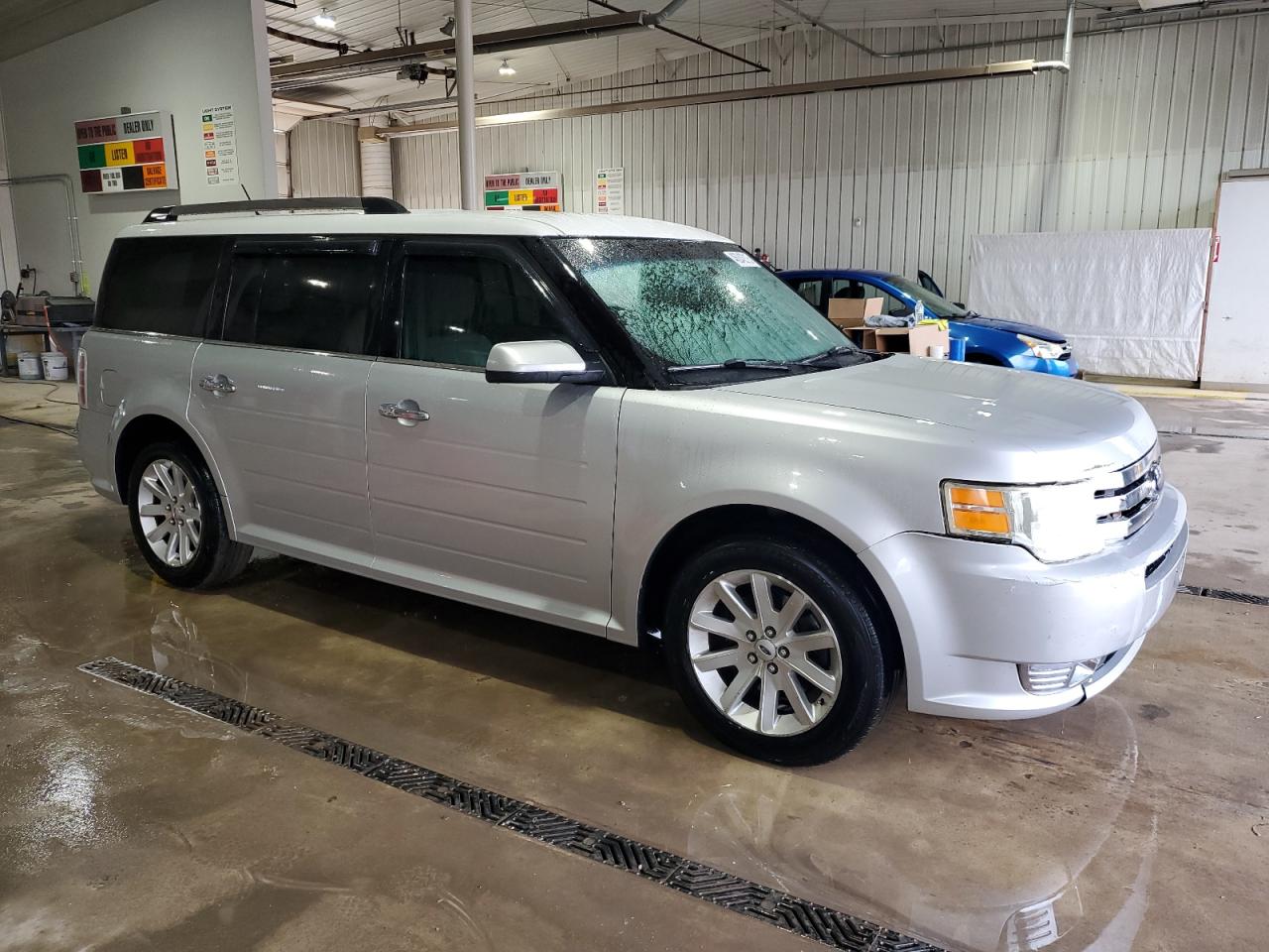 2009 Ford Flex VIN 2FMDK52C29BA05014 Copart auction photo, front end / minor dent/scratches damage thumbnail 4