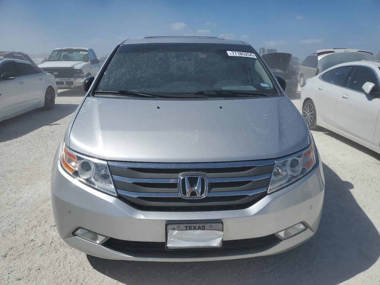 2012 Honda Odyssey VIN 5FNRL5H9XCB103141 Copart auction photo, water/flood damage thumbnail 5
