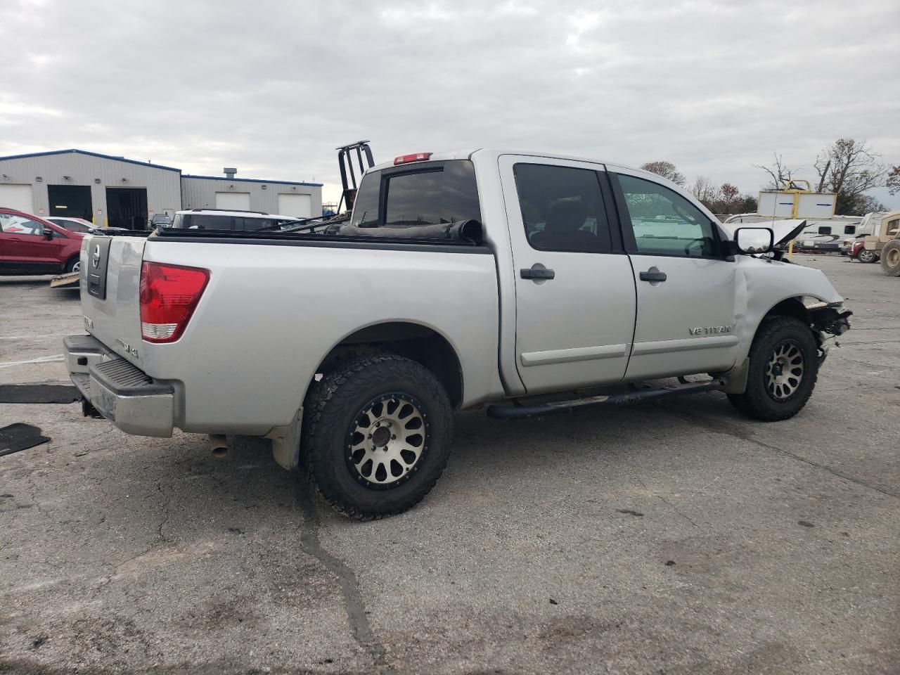 2011 Nissan Titan VIN 1N6BA0EJ9BN310352 Copart auction photo, front end / side damage thumbnail 3