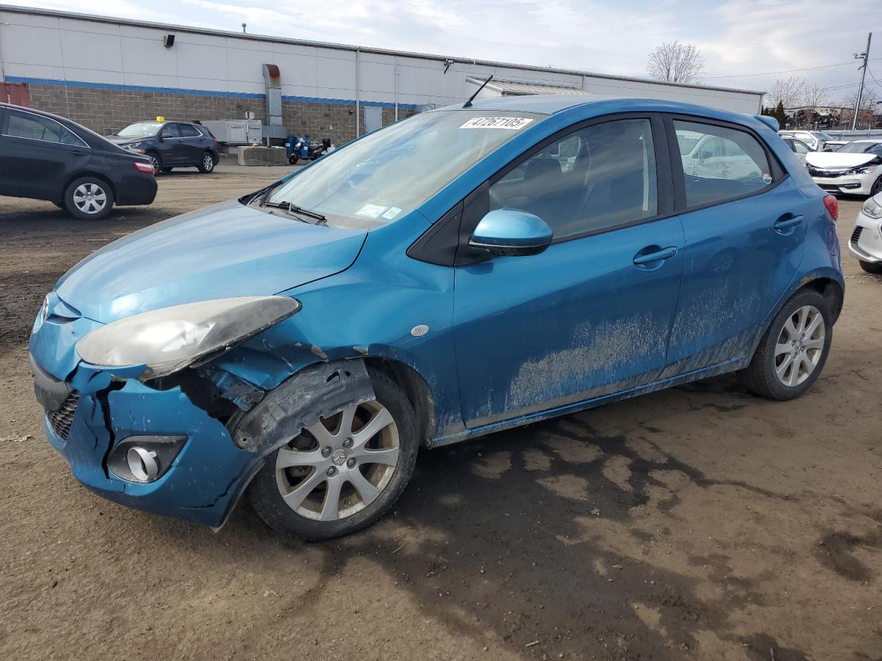 2011 Mazda 2 VIN JM1DE1HZ8B0110597 - Copart auction photo