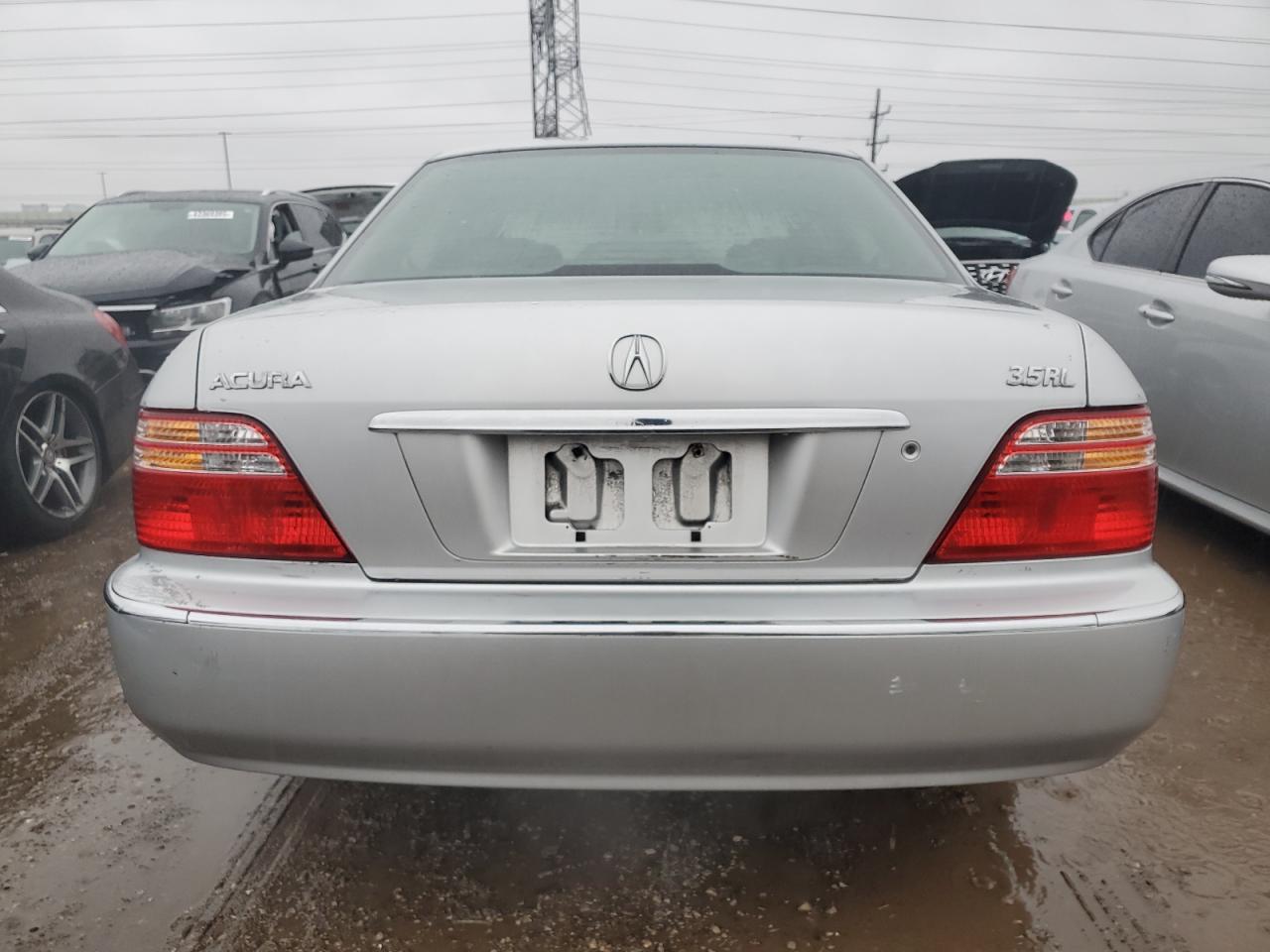2000 Acura RL VIN JH4KA9662YC002914 Copart auction photo, front end damage thumbnail 6