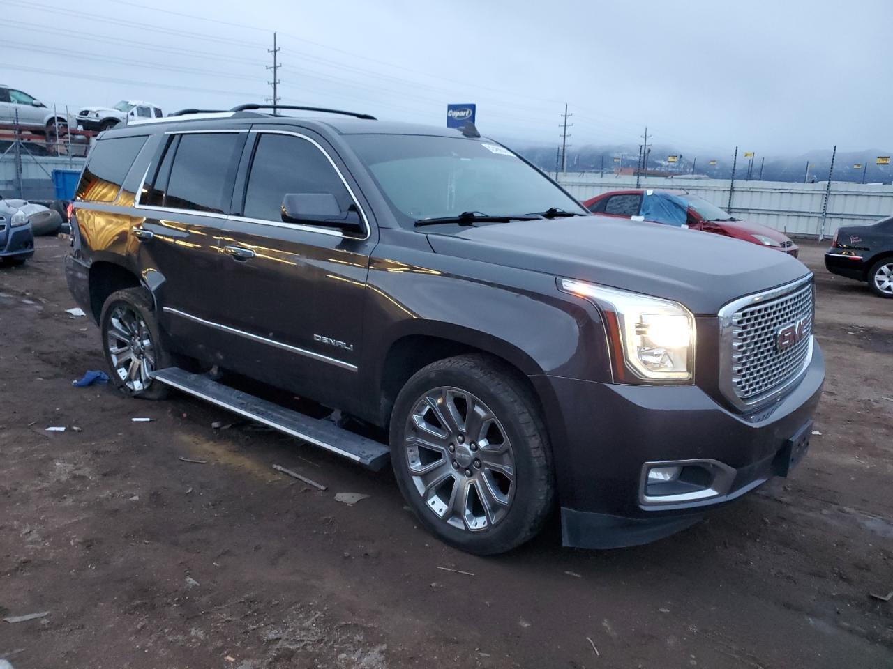2015 GMC Yukon VIN 1GKS2CKJ2FR537729 Copart auction photo, rear end / side damage thumbnail 4