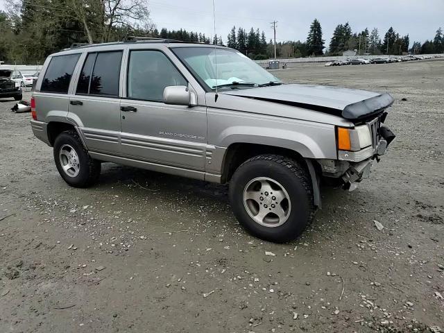 1997 Jeep Grand Cherokee VIN 1J4GZ78Y4VC693193 Copart auction photo, front end damage thumbnail 11