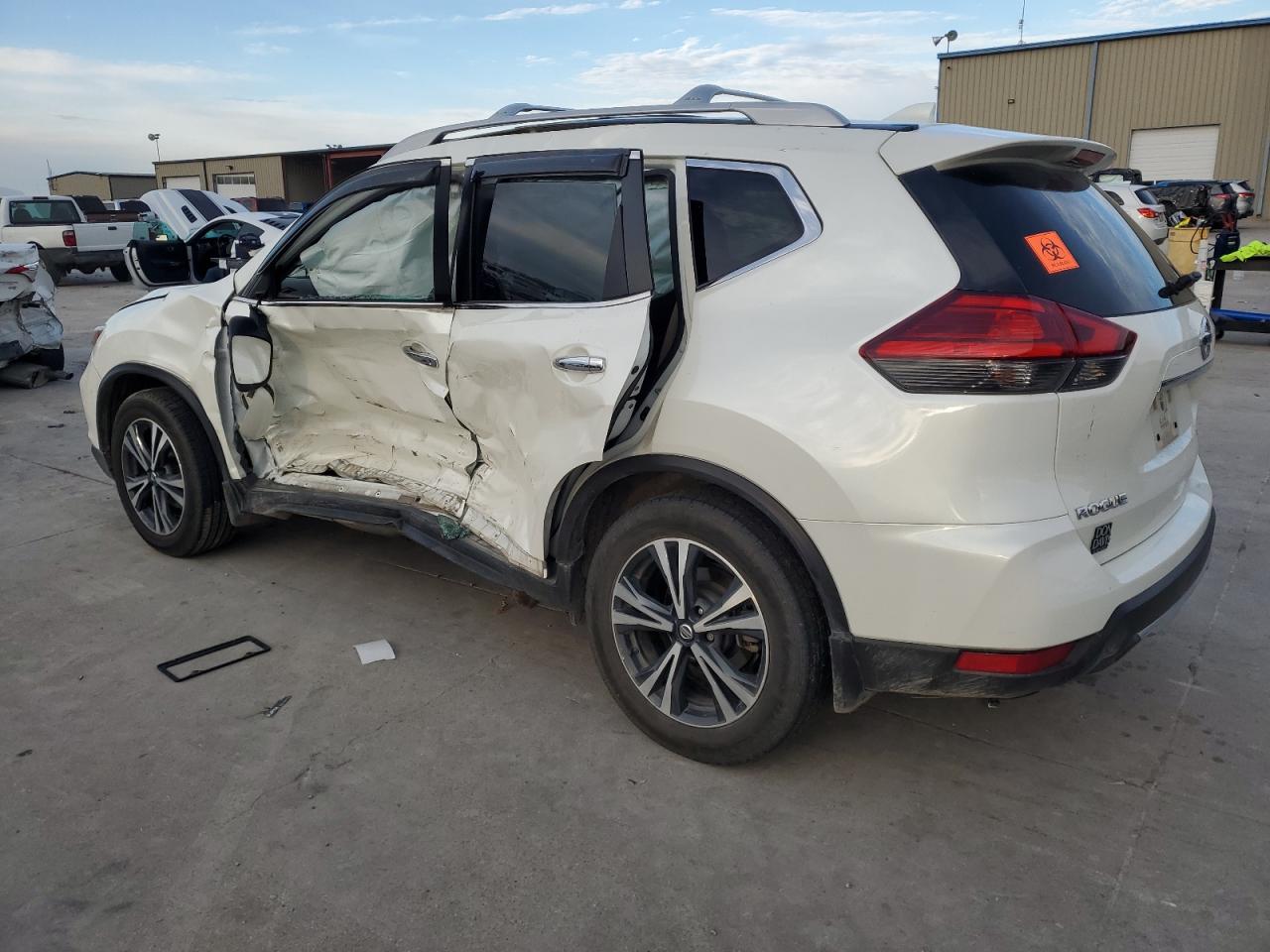 2017 Nissan Rogue VIN 5N1AT2MT0HC825974 Copart auction photo, side / hail damage thumbnail 2
