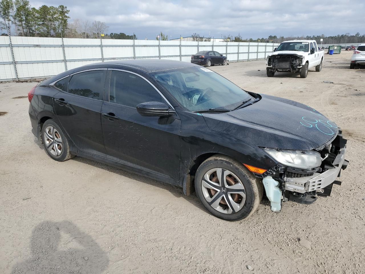 2017 Honda Civic VIN 2HGFC2F5XHH551075 Copart auction photo, front end / side damage thumbnail 4