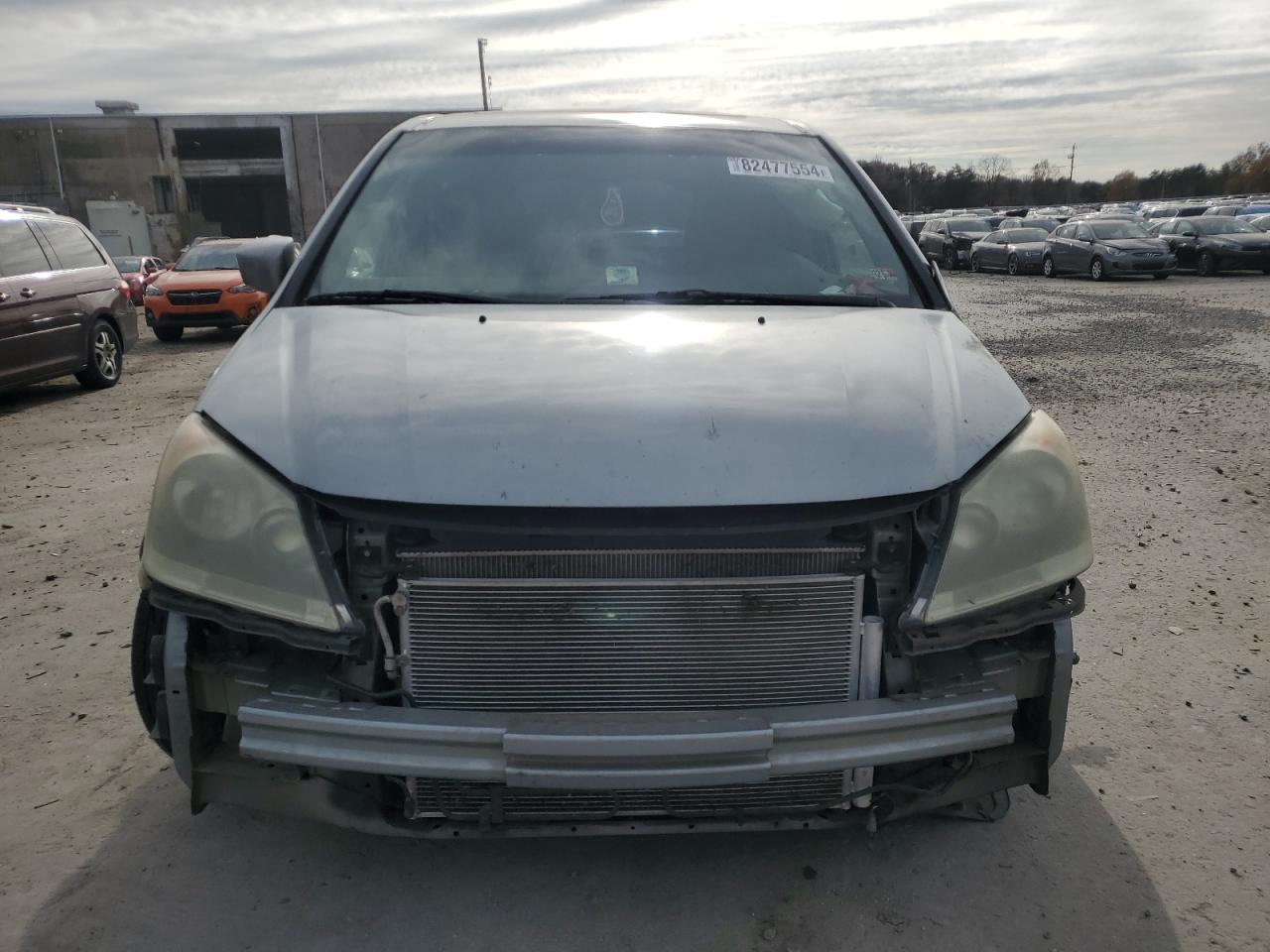 2009 Honda Odyssey VIN 5FNRL38779B005924 Copart auction photo, side / front end damage thumbnail 5