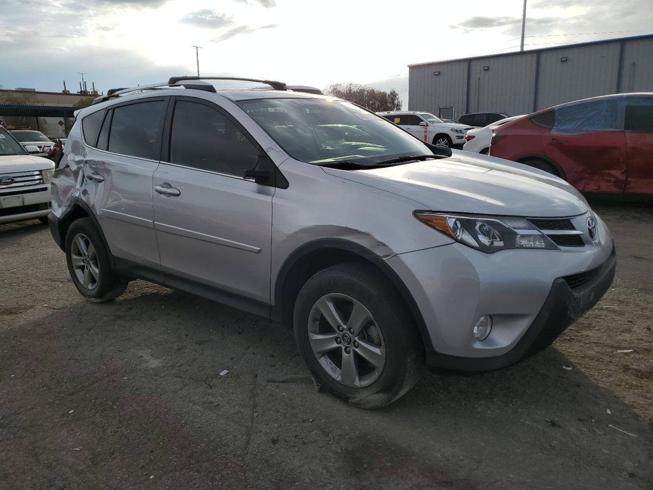 2015 Toyota RAV 4 VIN JTMWFREV4FD066750 Copart auction photo, all over damage thumbnail 4