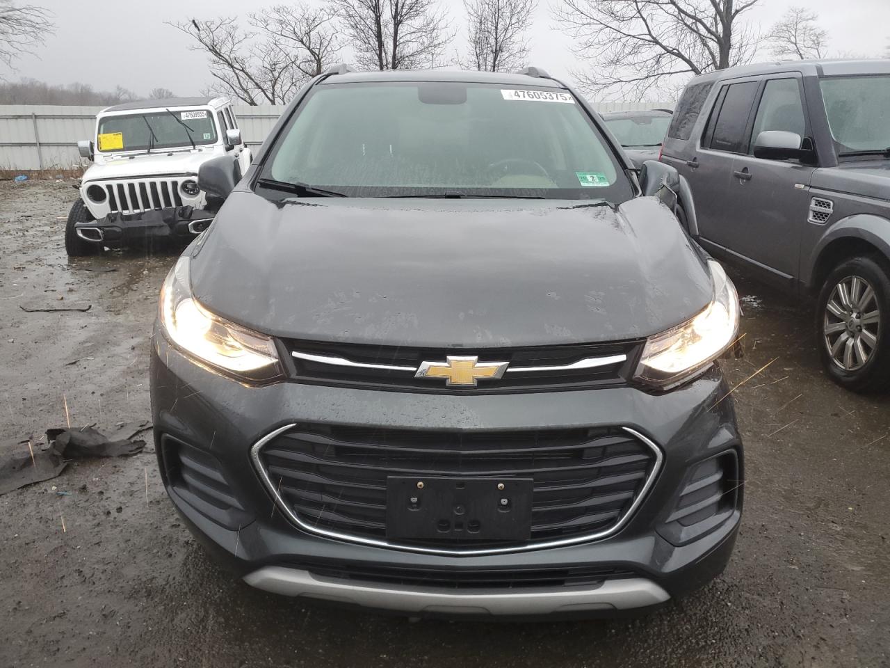 2018 Chevrolet Trax VIN KL7CJLSB7JB597502 Copart auction photo, side / front end damage thumbnail 5