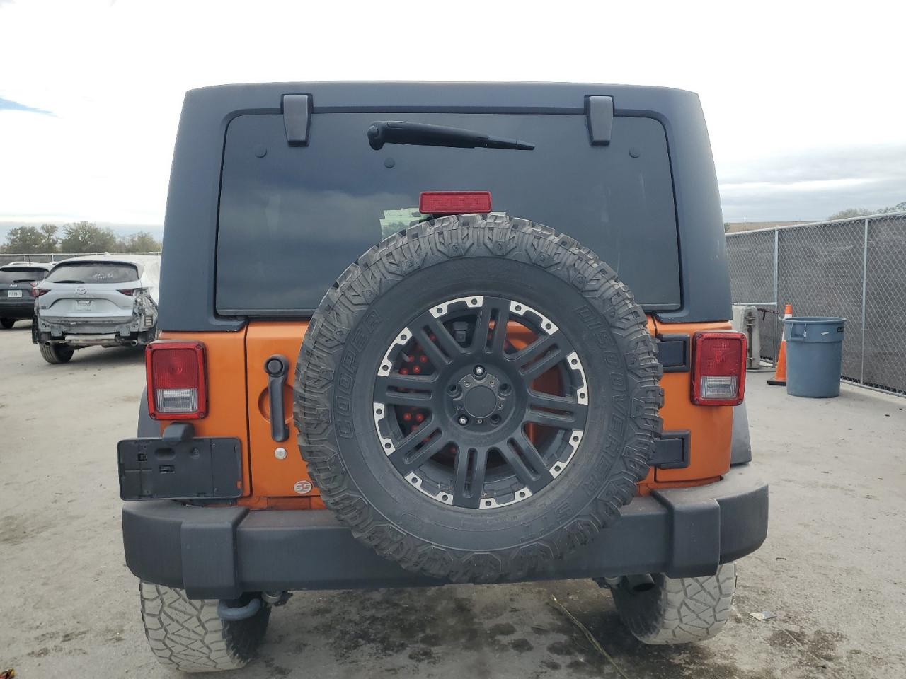 2011 Jeep Wrangler VIN 1J4BA3H10BL629659 Copart auction photo, minor dent/scratches damage thumbnail 6