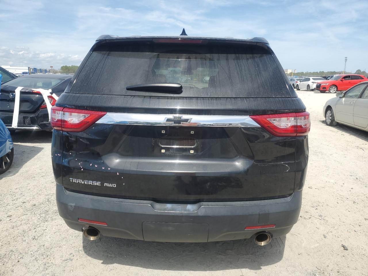 2019 Chevrolet Traverse VIN 1GNEVFKW5KJ202249 Copart auction photo, front end / minor dent/scratches damage thumbnail 6