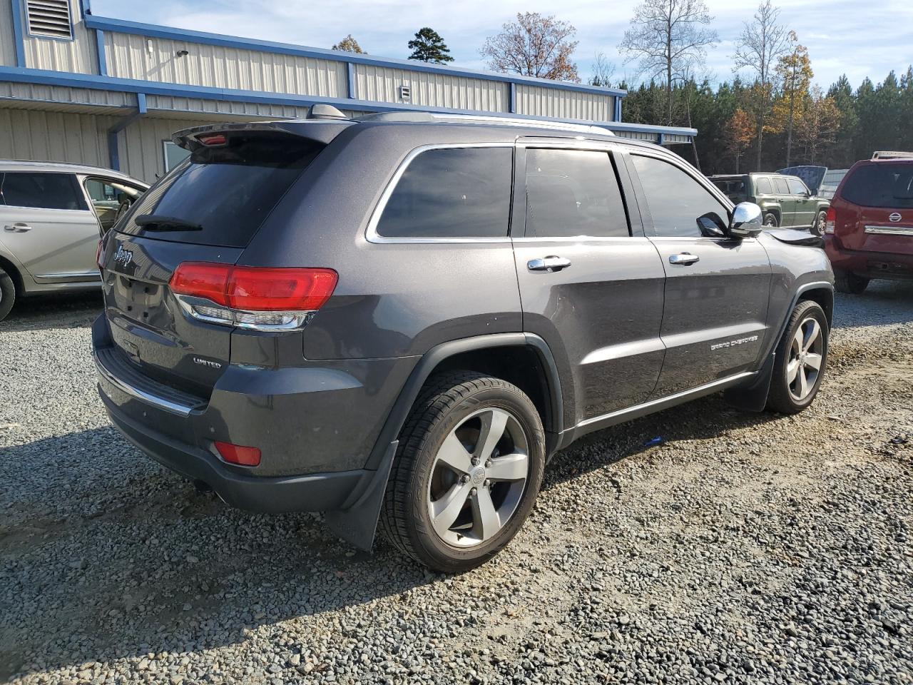 2015 Jeep Grand Cherokee VIN 1C4RJEBG1FC230990 Copart auction photo, front end / side damage thumbnail 3