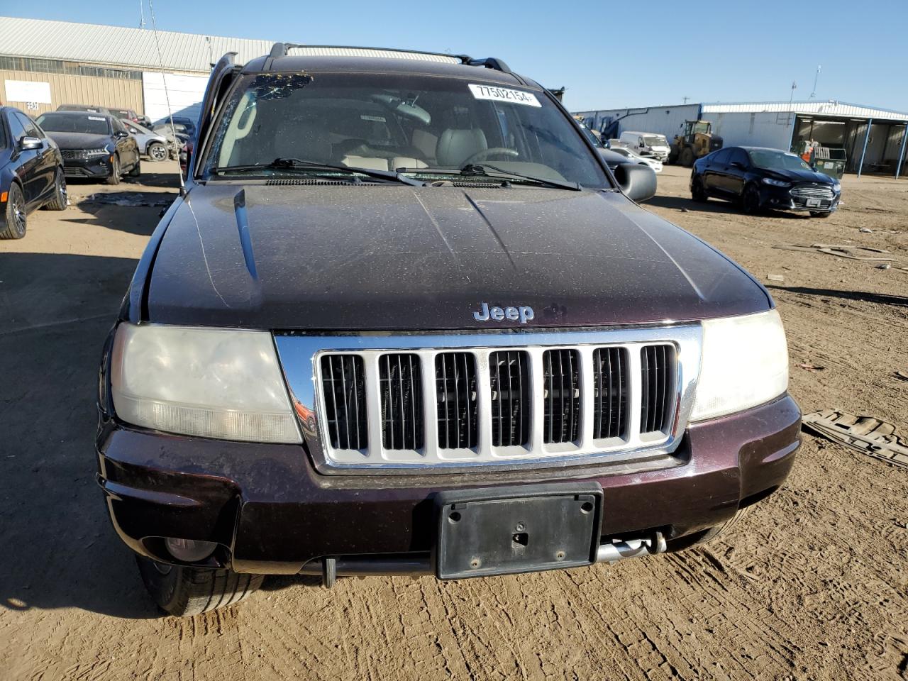 2004 Jeep Grand Cherokee VIN 1J8GW58N44C138146 Copart auction photo, all over damage thumbnail 5