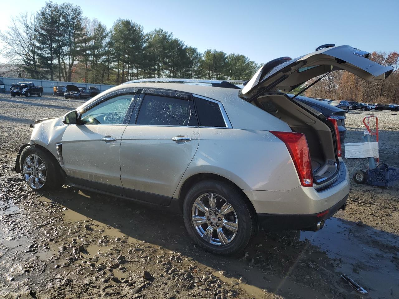 2014 Cadillac SRX VIN 3GYFNEE37ES554111 Copart auction photo, front end / side damage thumbnail 2