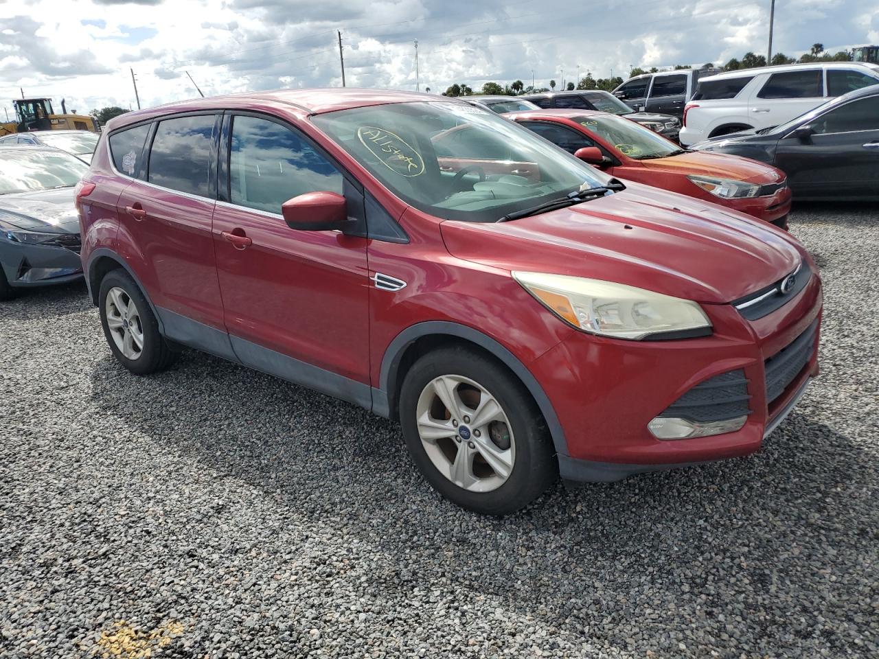 2014 Ford Escape VIN 1FMCU0GX5EUE21017 Copart auction photo, water/flood damage thumbnail 4