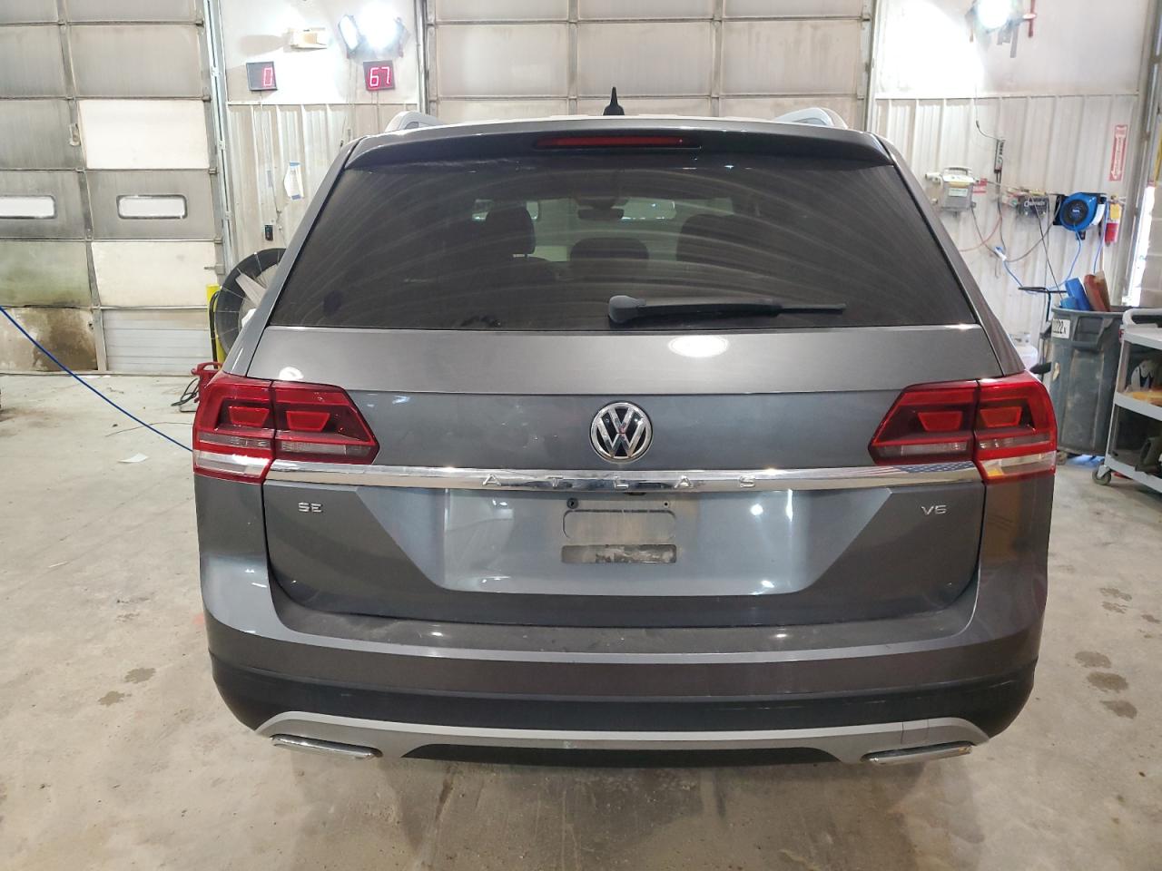 2019 Volkswagen Atlas VIN 1V2WR2CA6KC569791 Copart auction photo, front end / side damage thumbnail 6