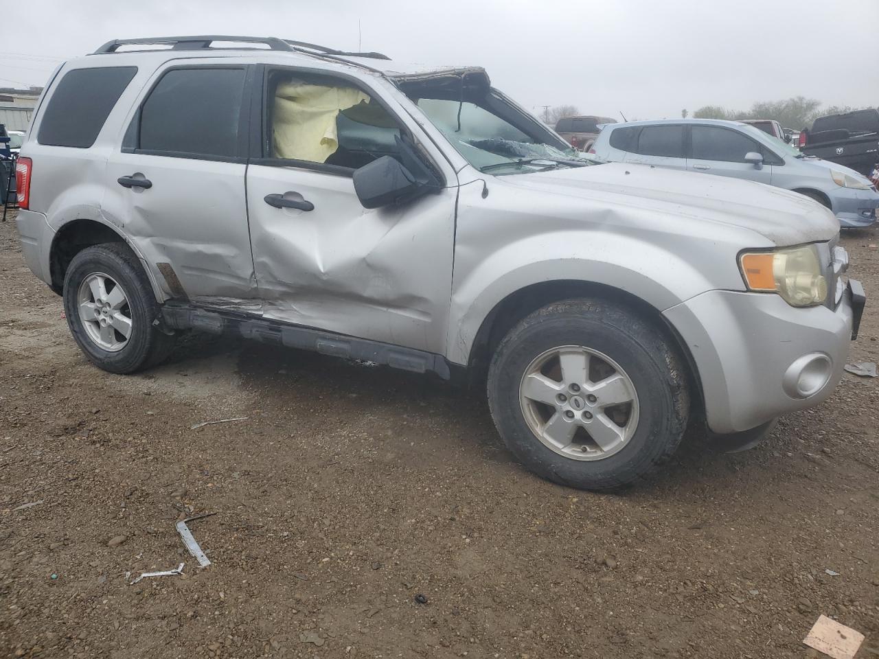 2009 Ford Escape VIN 1FMCU037X9KD15234 Copart auction photo, rollover / all over damage thumbnail 4