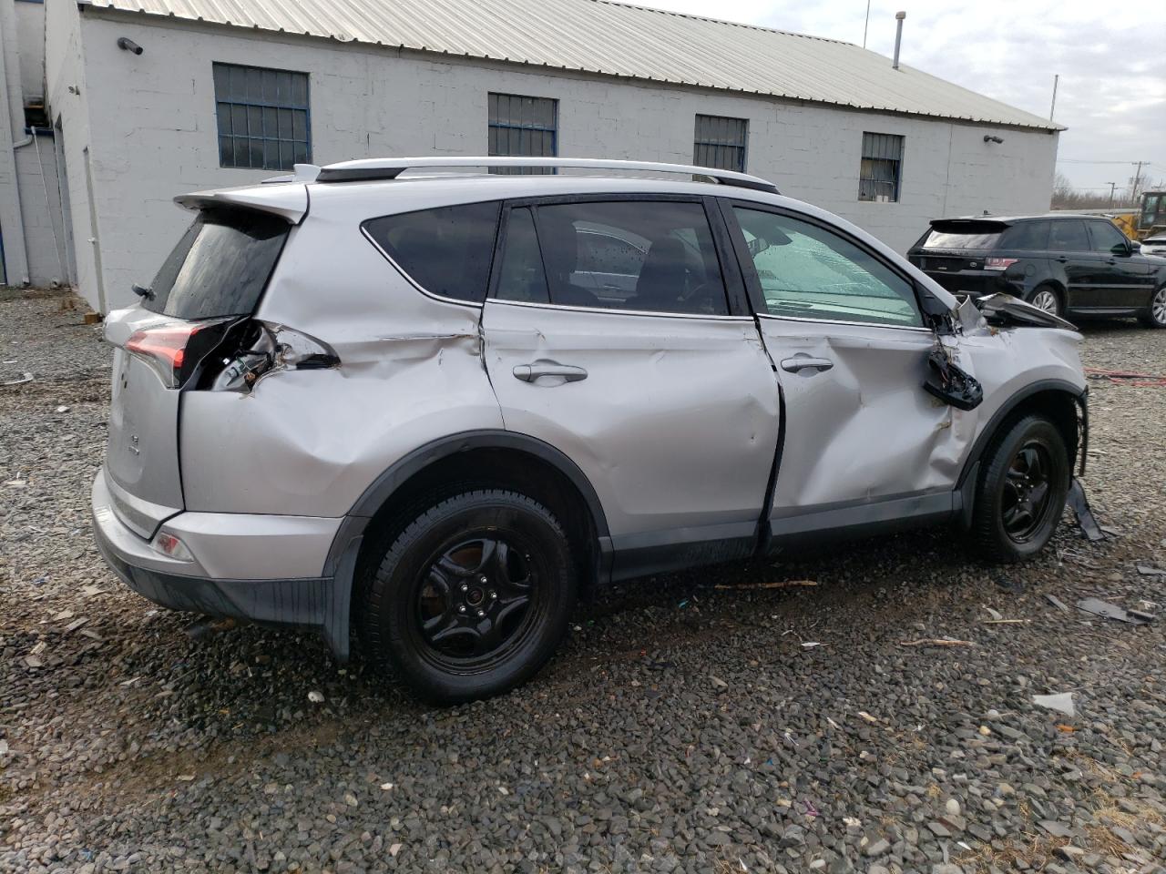 2018 Toyota RAV 4 VIN 2T3BFREV2JW710272 Copart auction photo, side / front end damage thumbnail 3