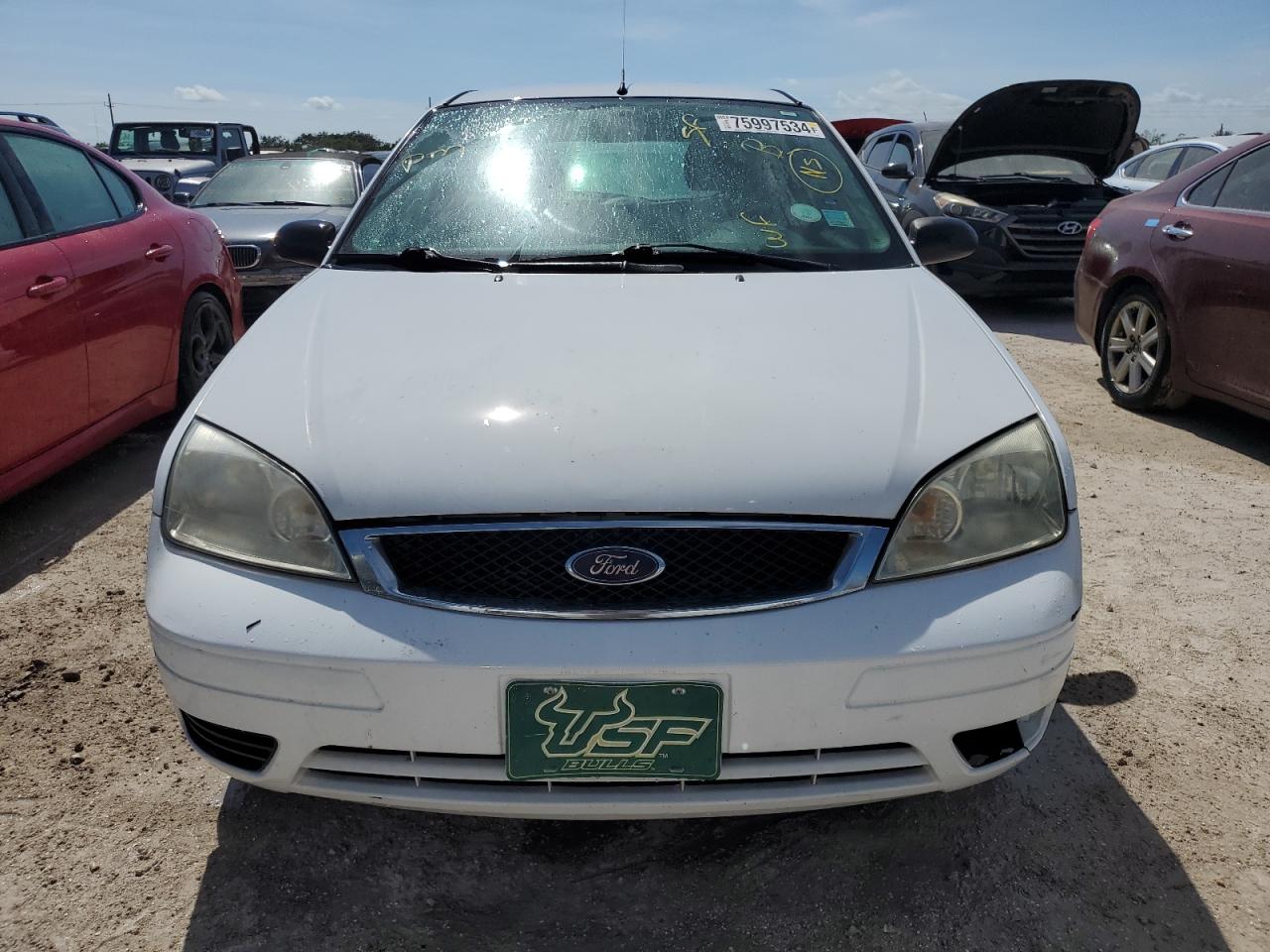 2006 Ford Focus VIN 1FAFP31N06W162661 Copart auction photo, water/flood damage thumbnail 5
