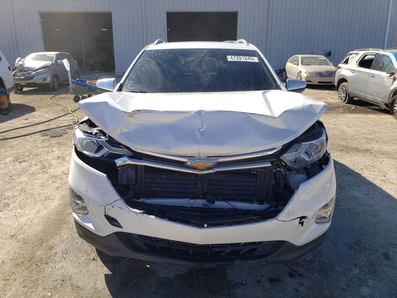 2021 Chevrolet Equinox VIN 3GNAXNEVXMS168882 Copart auction photo, front end damage thumbnail 5