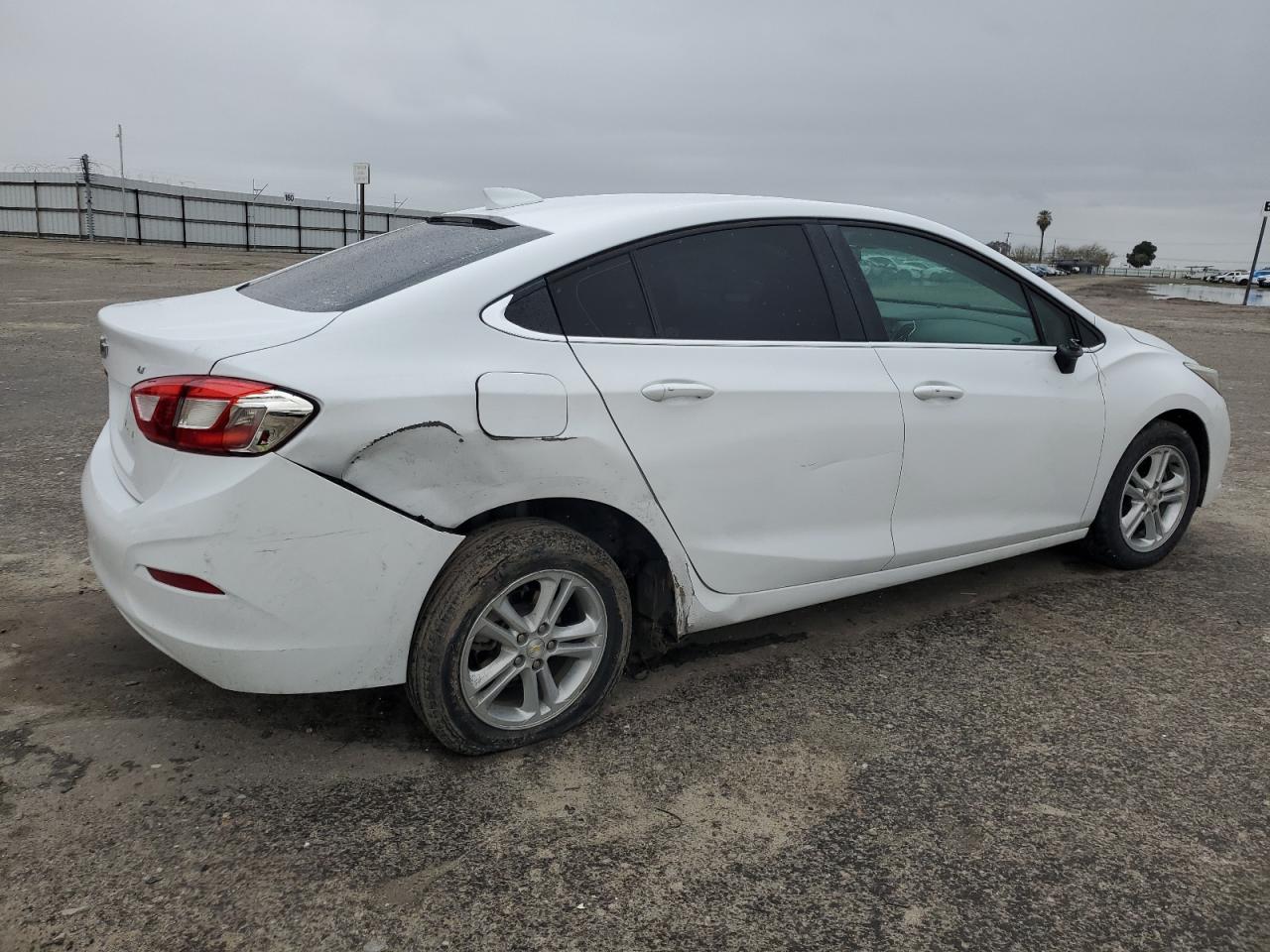2018 Chevrolet Cruze VIN 1G1BE5SM8J7228952 Copart auction photo, side / rear end damage thumbnail 3