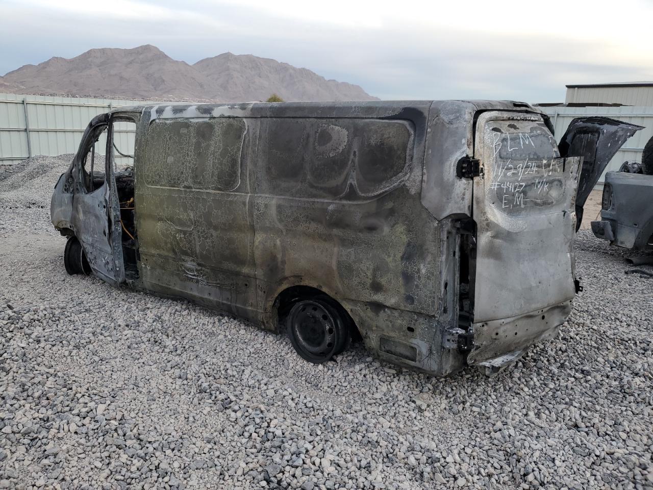 2015 Ford Transit VIN 1FTNR1YM0FKA29858 Copart auction photo, burn damage thumbnail 2
