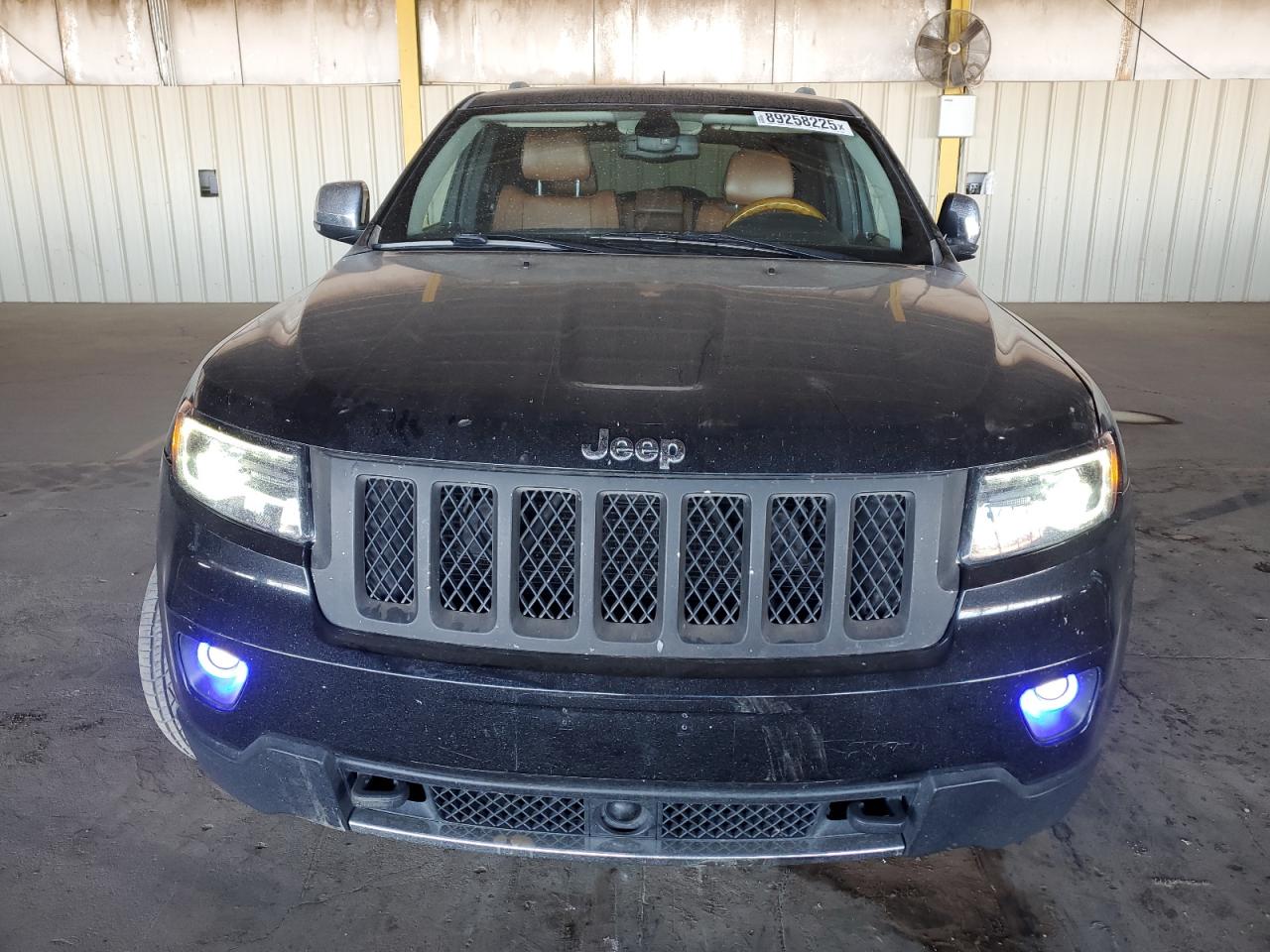 2012 Jeep Grand Cherokee VIN 1C4RJFCTXCC179969 Copart auction photo, front end / side damage thumbnail 5