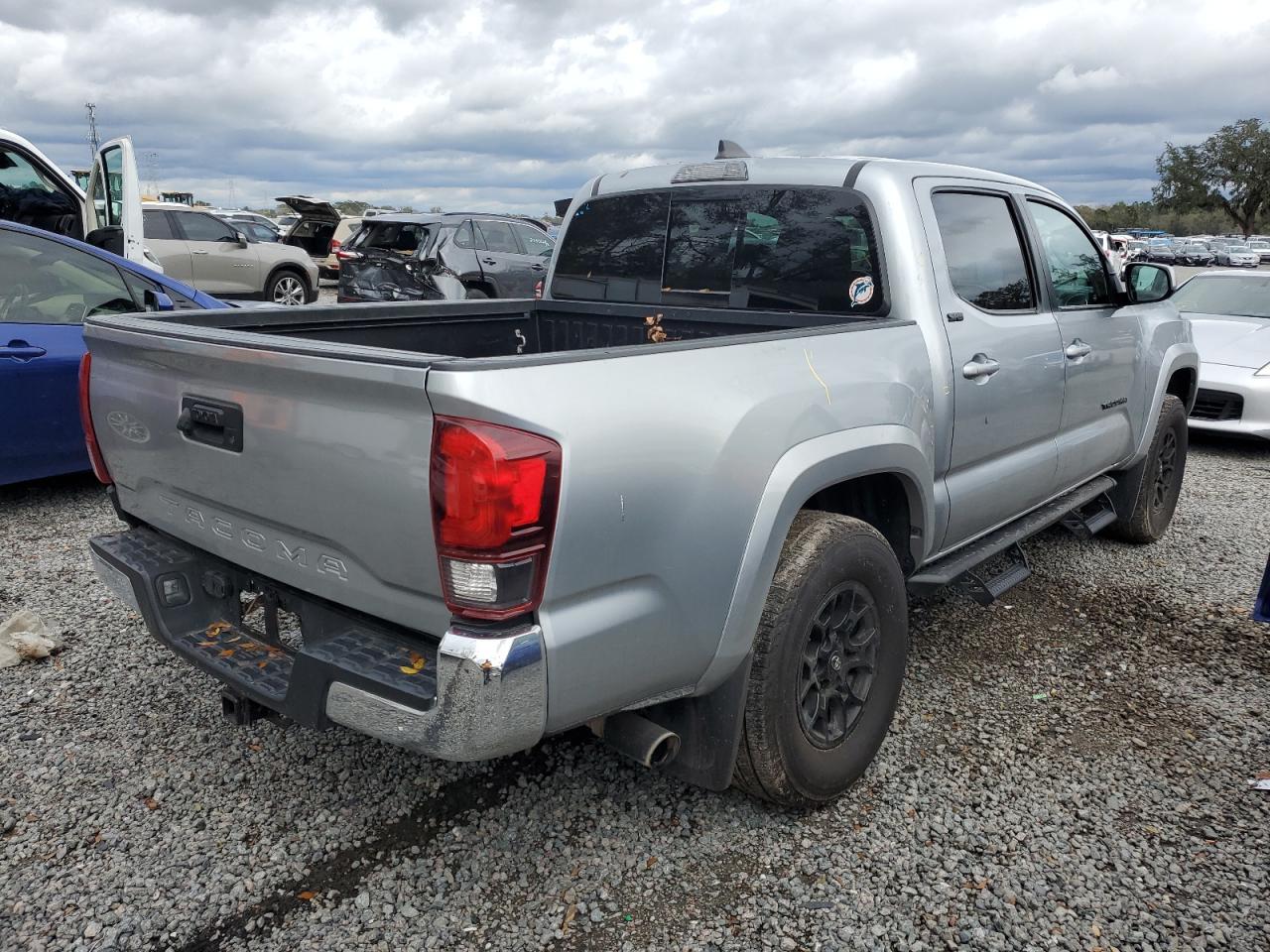 2022 Toyota Tacoma VIN 3TMAZ5CN5NM192941 Copart auction photo, side / all over damage thumbnail 3