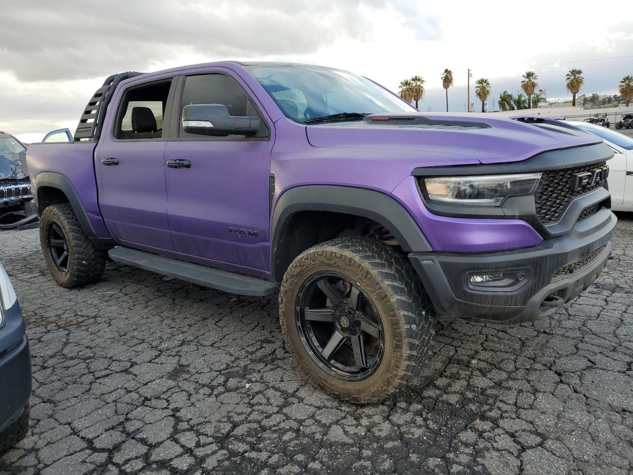 2021 RAM 1500 VIN 1C6SRFU90MN902187 Copart auction photo, vandalism damage thumbnail 4