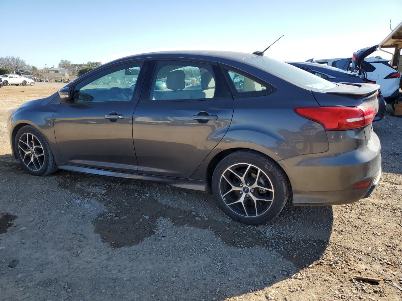 2015 Ford Focus VIN 1FADP3F23FL311278 Copart auction photo, top/roof damage thumbnail 2