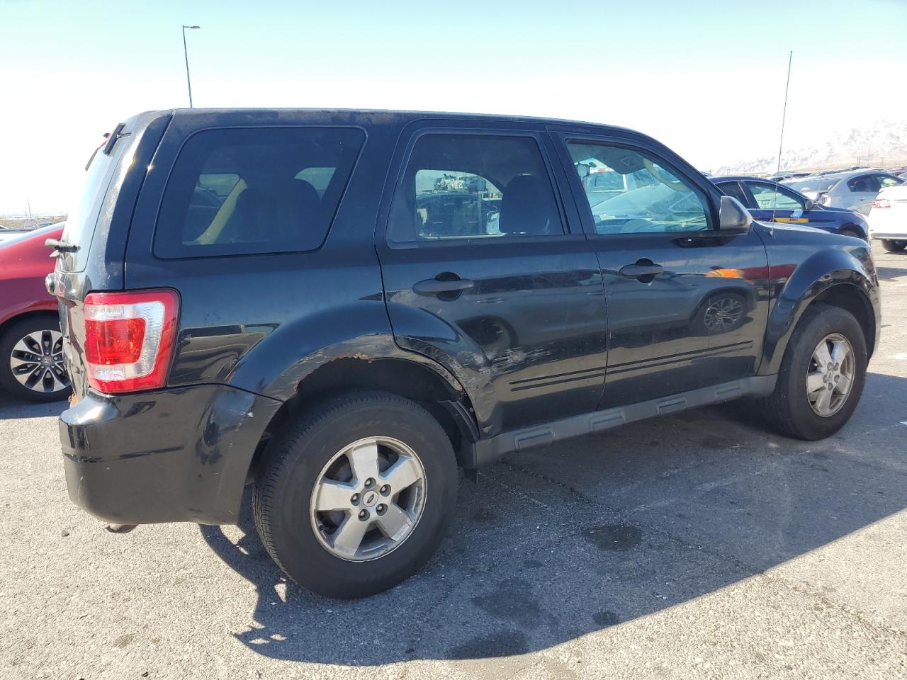 2011 Ford Escape VIN 1FMCU0C74BKB34877 Copart auction photo, rear end damage thumbnail 3