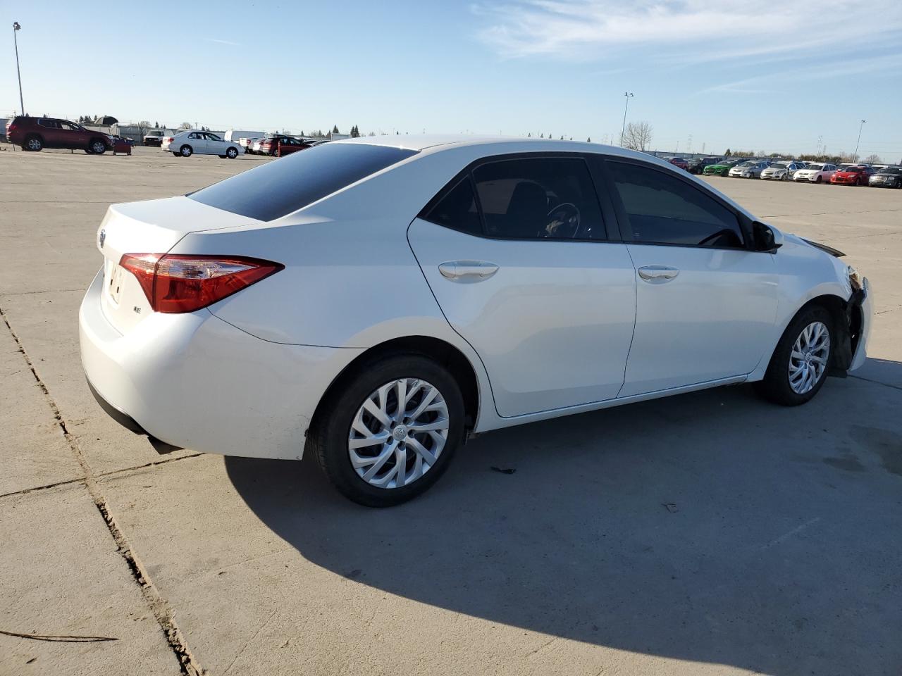 2018 Toyota Corolla VIN 5YFBURHE7JP758863 Copart auction photo, front end / side damage thumbnail 3