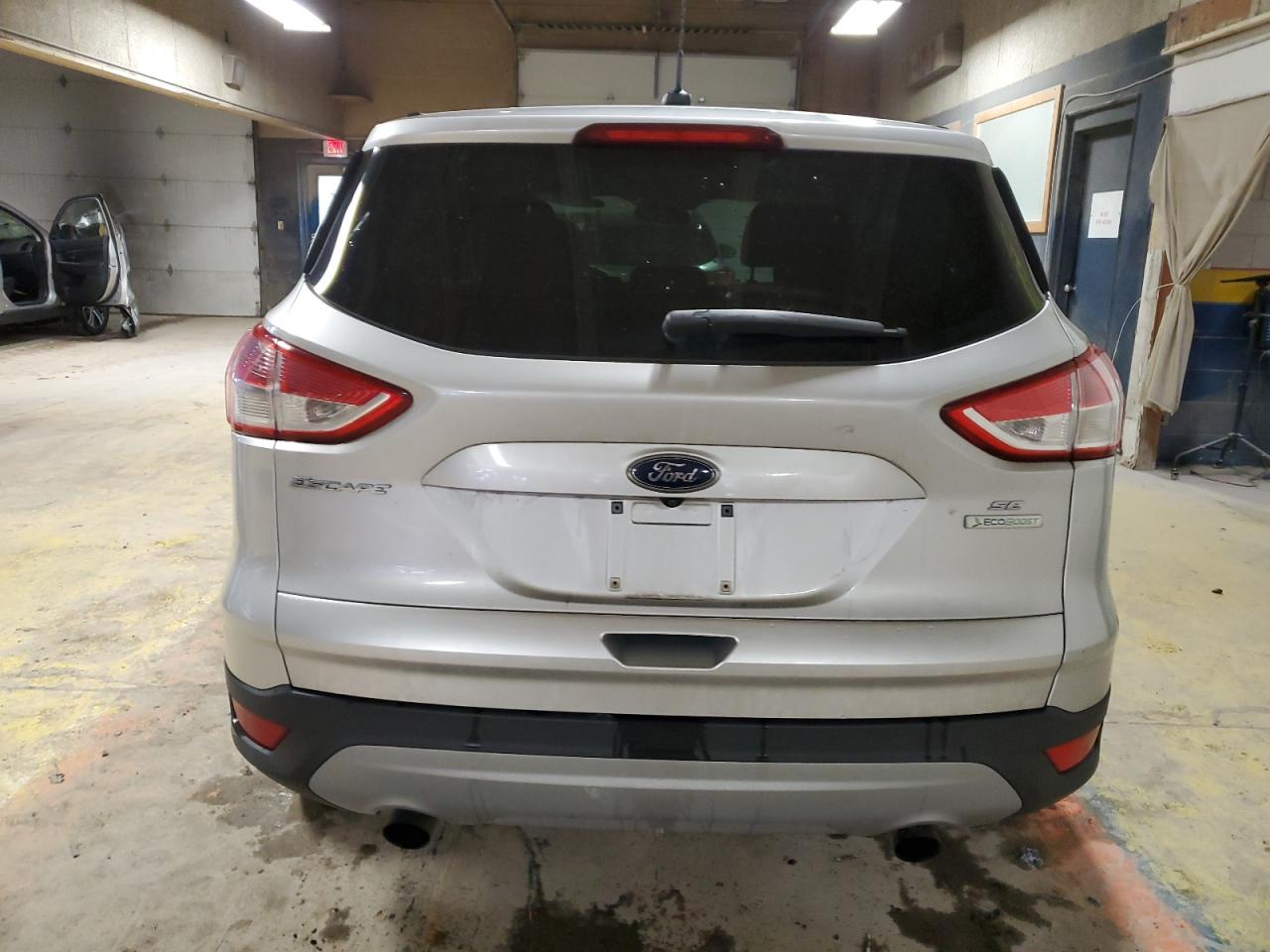 2016 Ford Escape VIN 1FMCU0GX8GUB41143 Copart auction photo, front end / side damage thumbnail 6