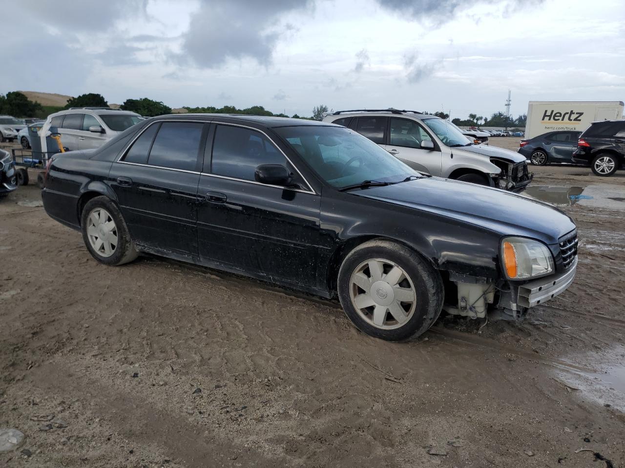 2004 Cadillac De Ville VIN 1G6KD54Y24U247435 Copart auction photo, front end / minor dent/scratches damage thumbnail 4