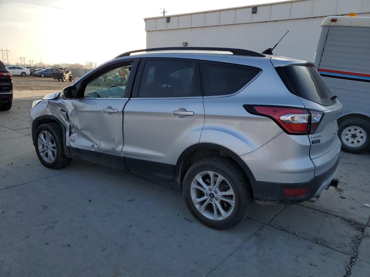 2018 Ford Escape VIN 1FMCU9HD7JUD04963 Copart auction photo, side / front end damage thumbnail 2