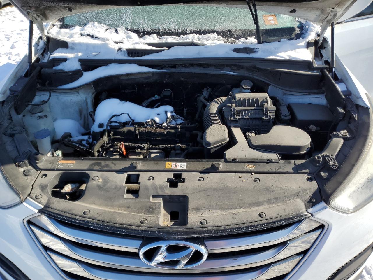 2015 Hyundai Santa Fe VIN 5XYZTDLB0FG272330 Copart auction photo, burn - engine damage thumbnail 11