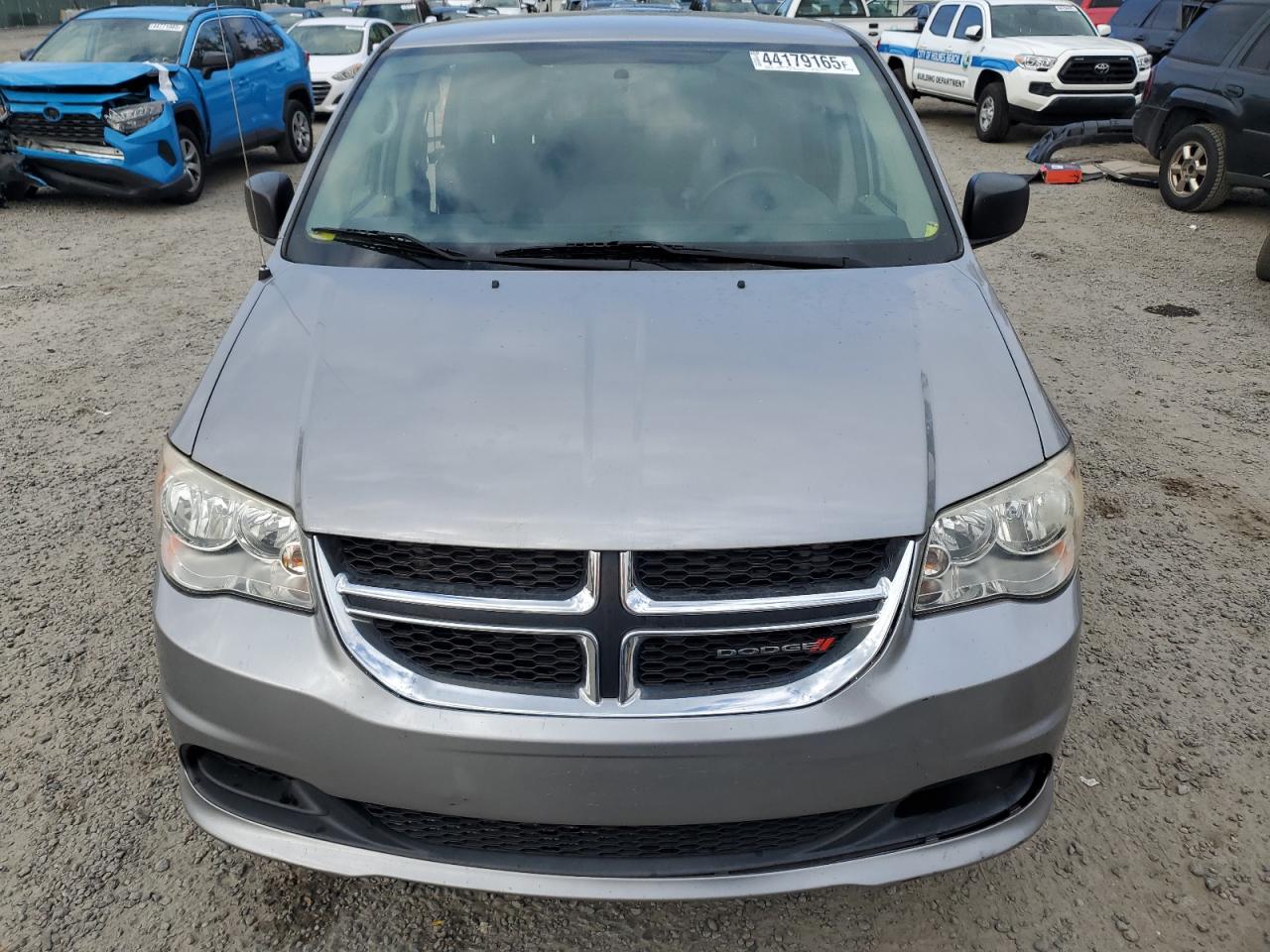 2016 Dodge Caravan VIN 2C4RDGBG9GR124752 Copart auction photo, side / rear end damage thumbnail 5