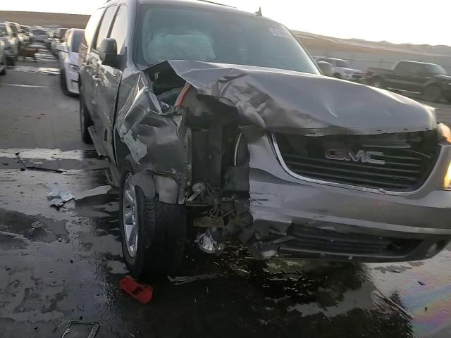 2007 GMC Yukon VIN 1GKFK163X7R206500 Copart auction photo, all over / hail damage thumbnail 12