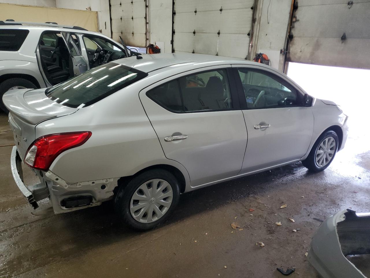 2019 Nissan Versa VIN 3N1CN7AP7KL853040 Copart auction photo, rear end / minor dent/scratches damage thumbnail 3